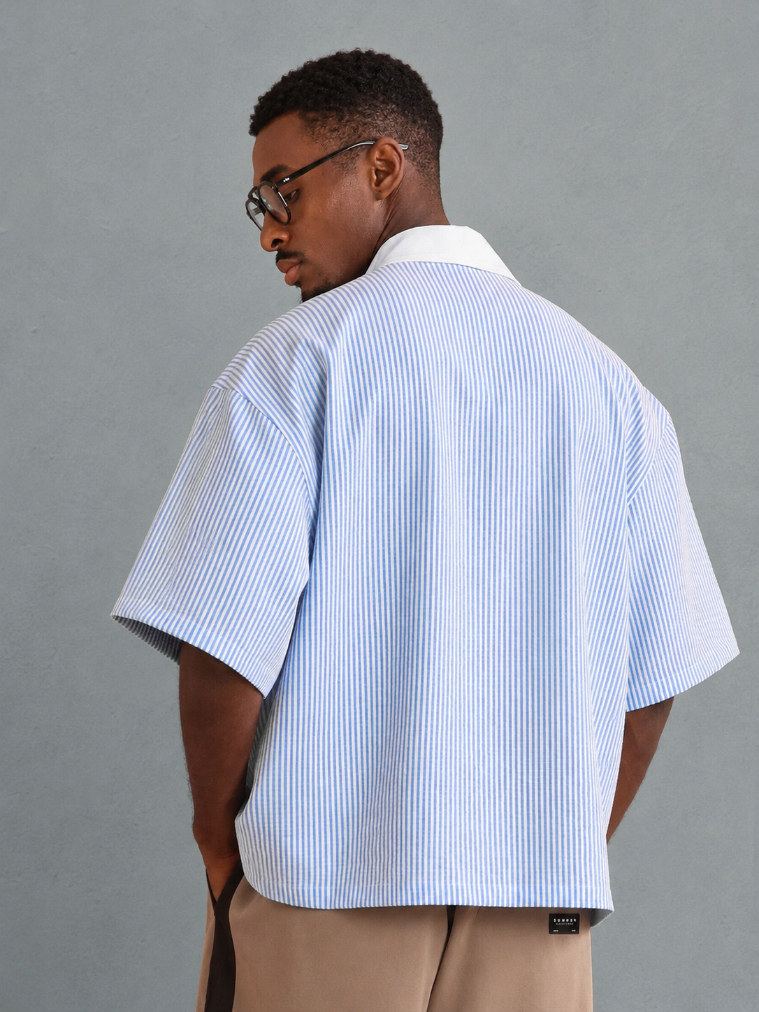 Polo homme à rayures avec fermeture zip